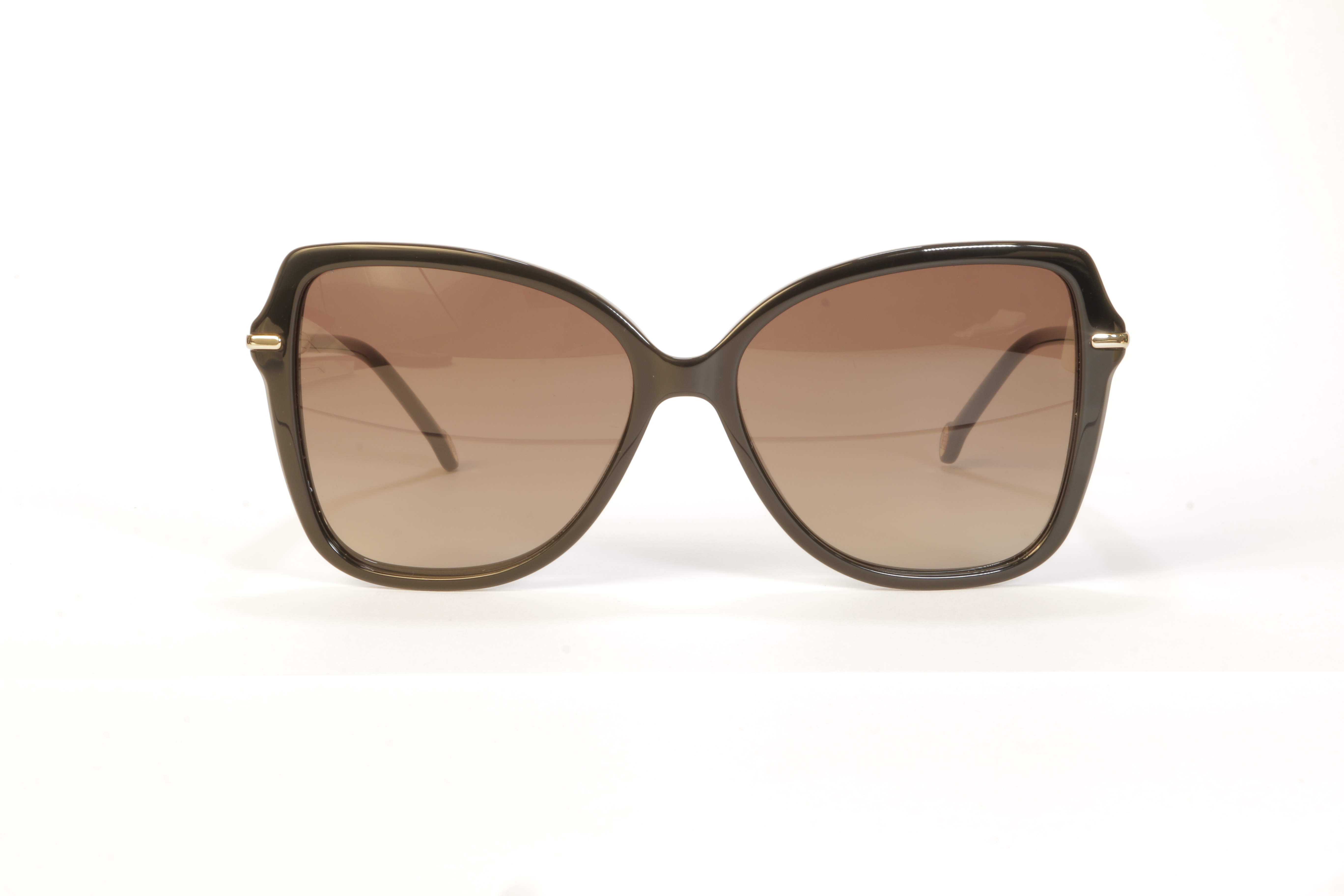 Gafas de sol Carolina Herrera HER0302-S 807HA para mujer, diseño cat-eye en color oscuro con lentes degradadas marrón, estilo elegante y sofisticado.